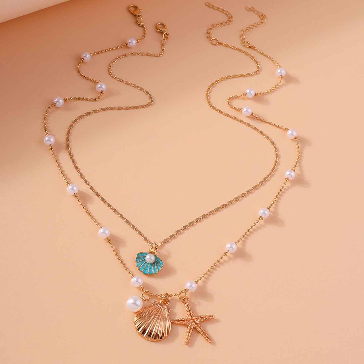 Gold Starfish Shell Necklace for Women Boho Layered Seashell Conch Shell Pearl Pendant Necklaces Set Bohemain Starfish Beach Necklaces Stack Beachy Summer Jewelry Outfits Accessories