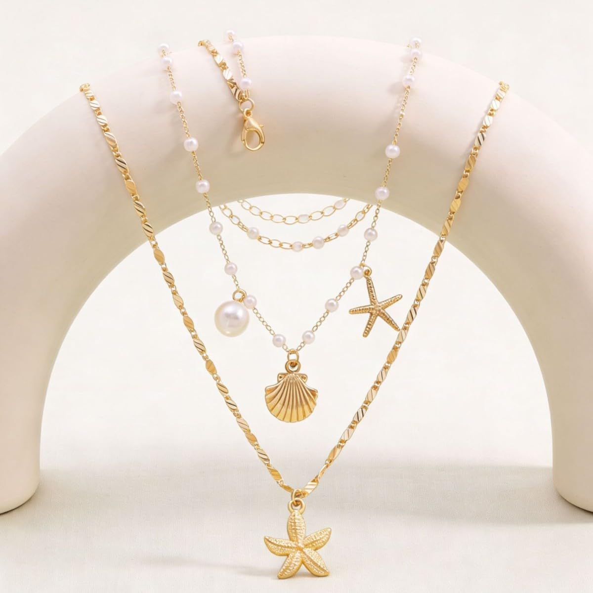 GYRMMUE Gold Starfish Necklaces for Women Boho Seashell Pendant Layered Necklaces Set Dainty Ocean Beach Charm Necklace Hawaiian Shell Stackable Beaded Necklace Summer Vacation Jewelry (White)