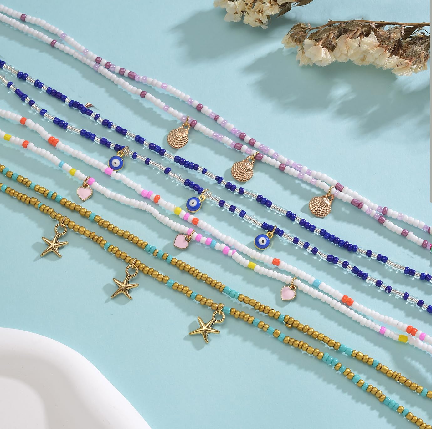 Tornito 8Pcs 31.5 Inches African Waist Bead Chain Elastic Belly Beads Butterfly Starfish Blue Evil Eye Flower Shell Layered Body Chain Colorful Jewelry Accessories for Women (E:8Pcs(Ocean))