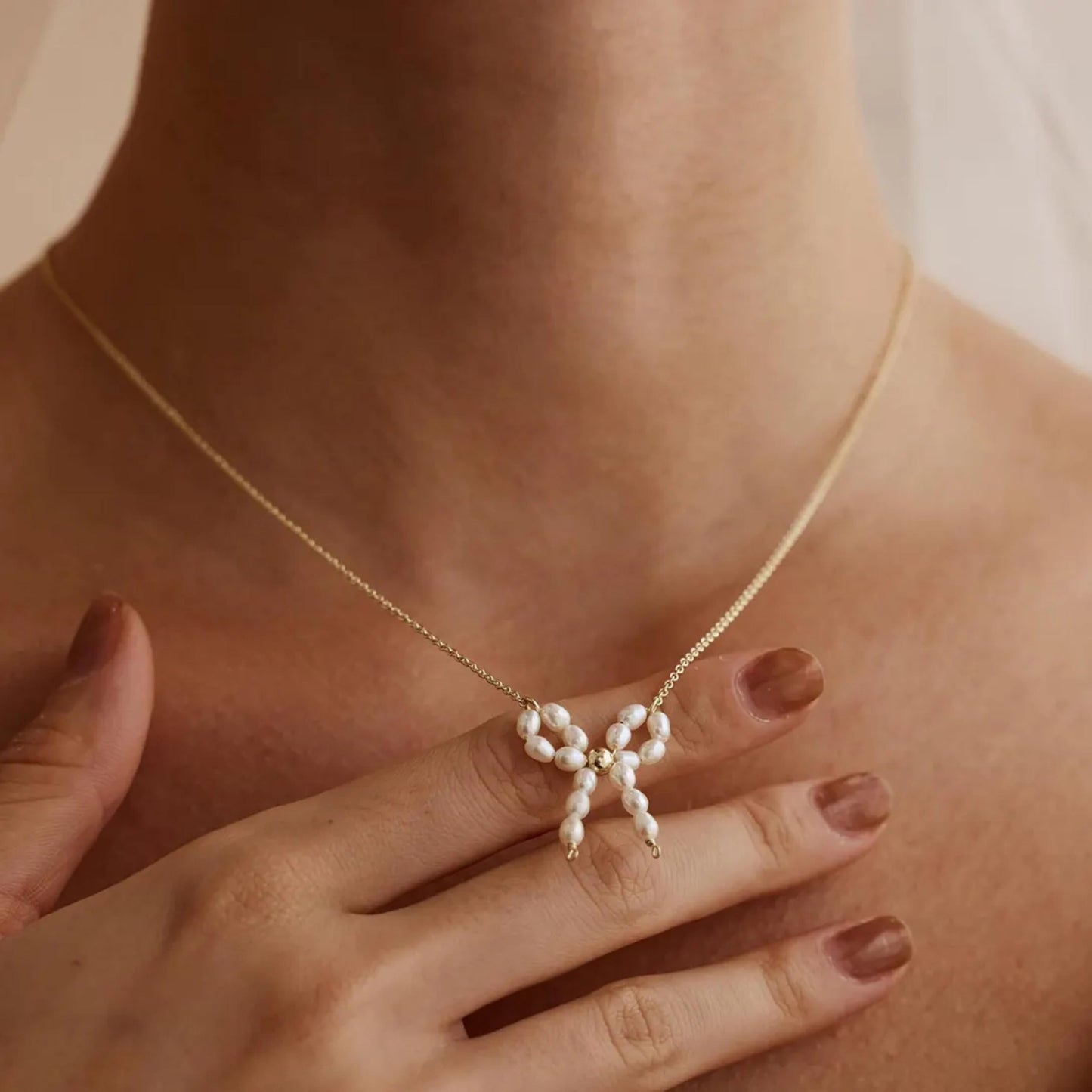 Caenyo Dainty Pearl Bow Pendant Necklace for Everyday Wear, 14K Gold Plated, Lightweight & Tarnish Resistant, Elegant Jewelry for Women