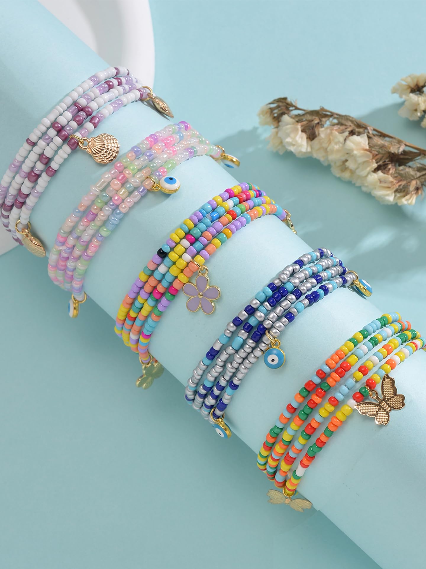 Tornito 8Pcs 31.5 Inches African Waist Bead Chain Elastic Belly Beads Butterfly Starfish Blue Evil Eye Flower Shell Layered Body Chain Colorful Jewelry Accessories for Women (E:8Pcs(Ocean))