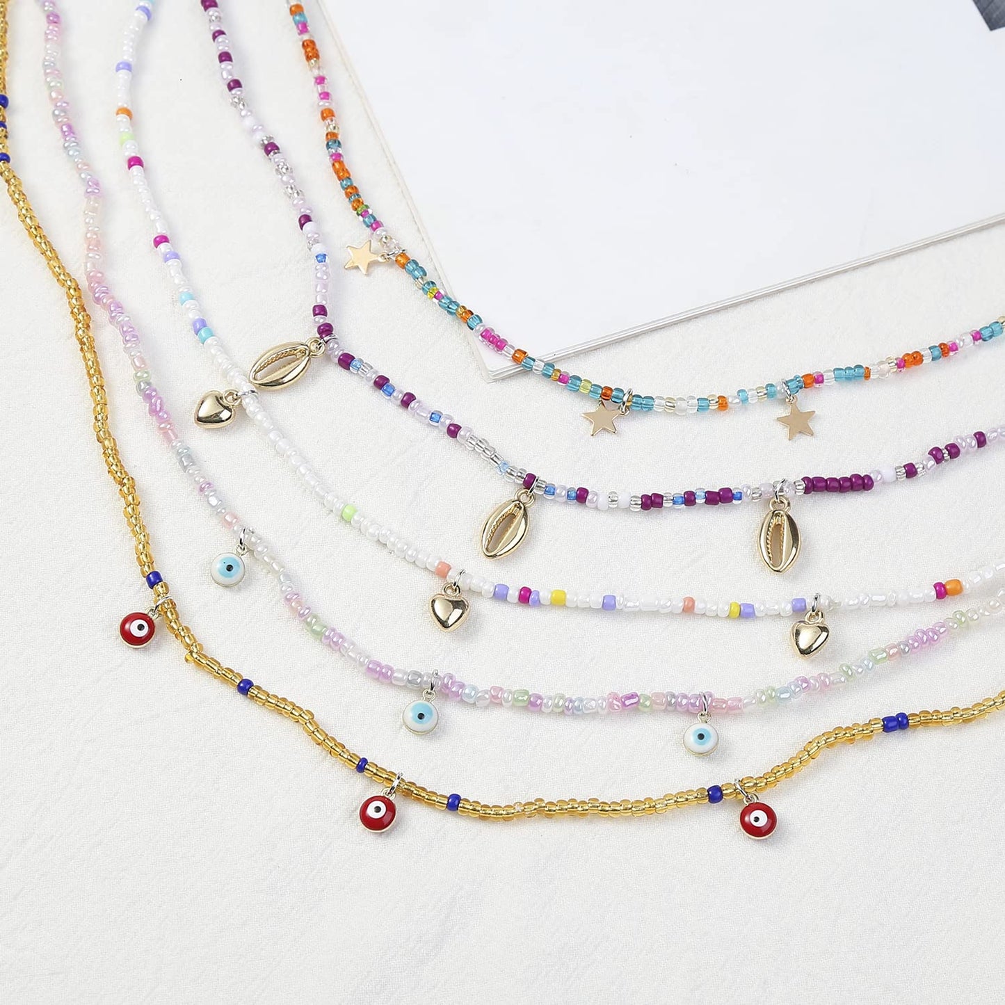 Waist Beads for Women Colorful Beaded Body Chain Elastic String Waist Chain Beach Bikini Belly Chains Sexy Body Jewelry for Women 12Pcs 27.5Inch