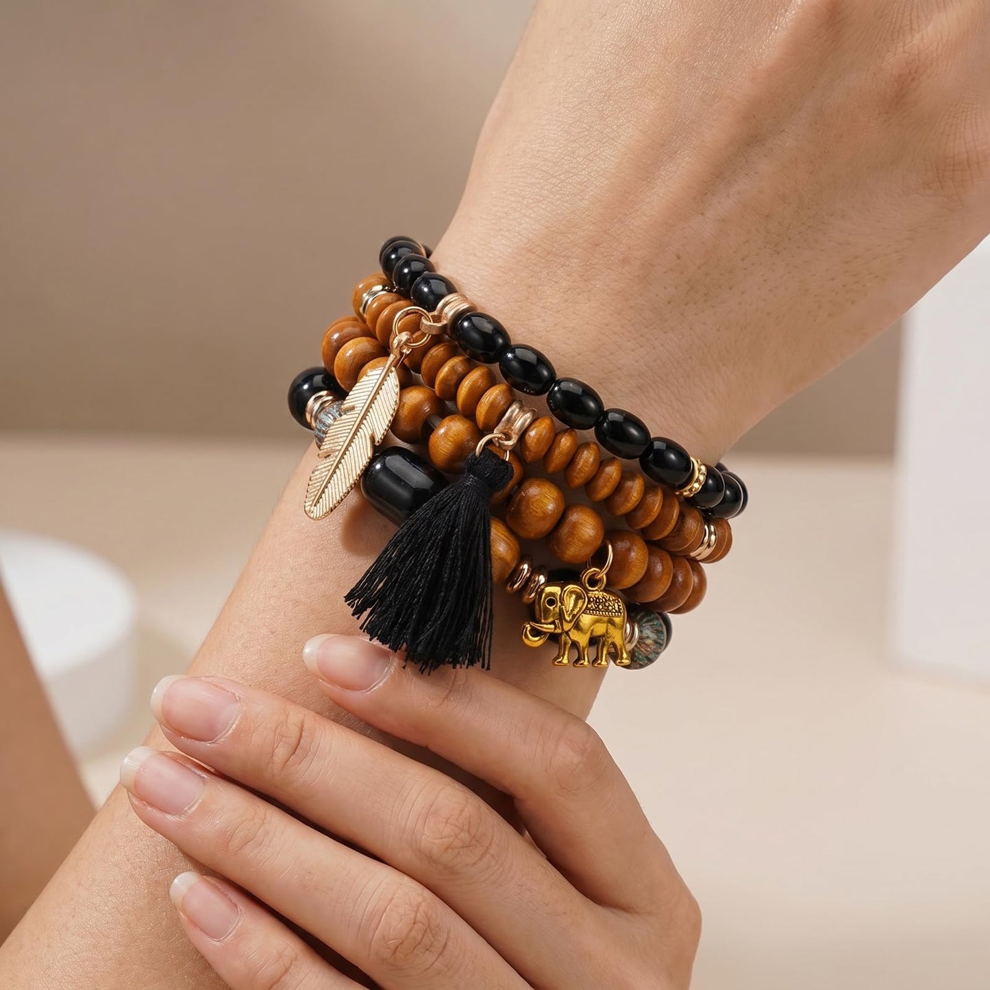 Briutn Bohemian Layered Beaded Bracelet Set Wood Beads with Feather Elephant Tassel Charms Stackable Stretch Bracelets for Women Boho Jewelry Gifts