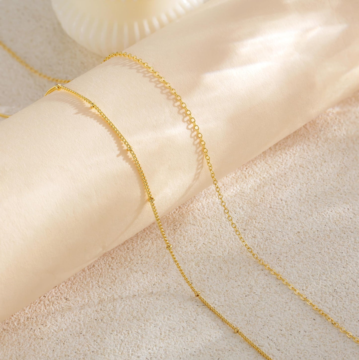 HABIKIP 14K Gold Plated Waist Beads Chain for Women, 2PCS Layered Gold Plated Belly Chain Belt Sexy Bikini Beach Waist Chain Adjustable Waterproof Cuban Body Chain Summer Jewelry Accessories for Women