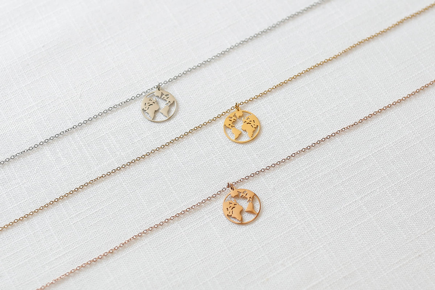 LUUK LIFESTYLE Necklace for women in stainless steel with globe pendant and HAPPINESS card, fashion jewelry for women, lucky charm, fashion accessory, 19” length, feminine jewelry, gift idea, gold